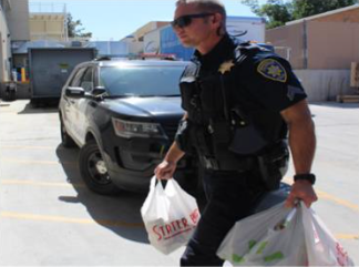 Officer with groceries